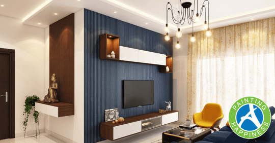 A living room with a tv on the wall above a stand and a window with a translucent curtain