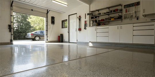 Durable, glossy polyaspartic floor coating in a garage.