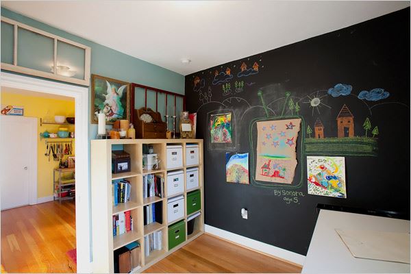 room with chalkboard wall